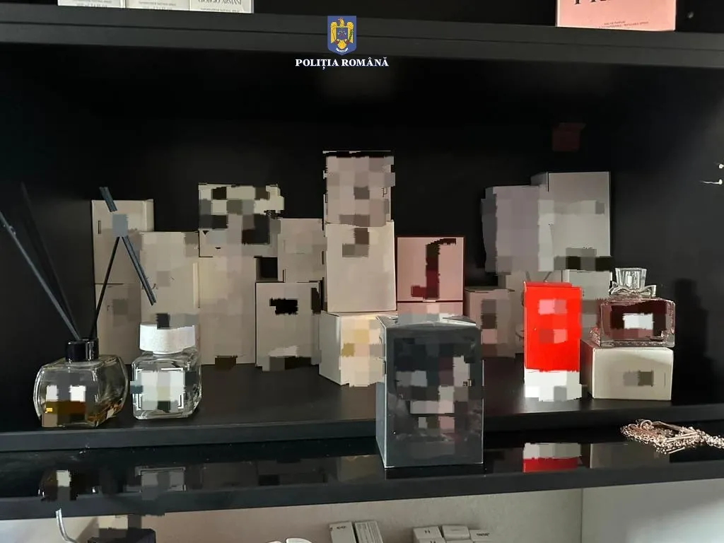 Percheziții într-un dosar de comercializare de produse contrafăcute – foto 3